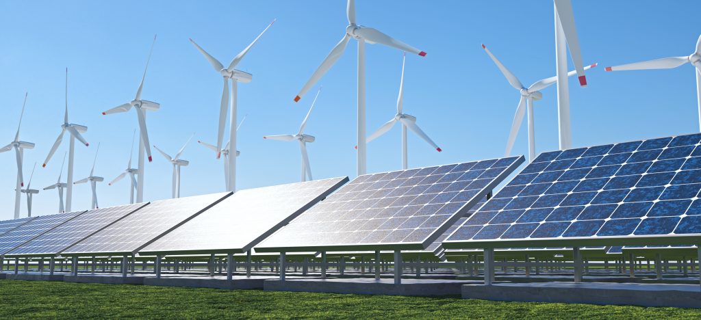 Renewable energy park with windmills and solar panels.